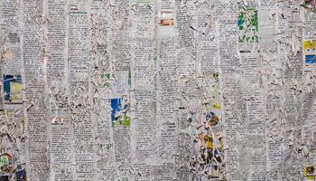 Crumpled newspaper texture background photo