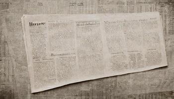 Crumpled newspaper texture background photo
