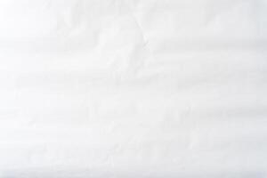 Top view of wrinkled or crumpled white stencil paper texture used for wrinkled or crumpled white paper background texture in decorative art work photo