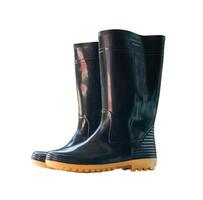 A pair of black gumboots or black boots for working in garden isolated on white background with clipping path photo