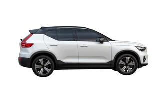 Side view of mini white SUV car isolated on white background with clipping path photo