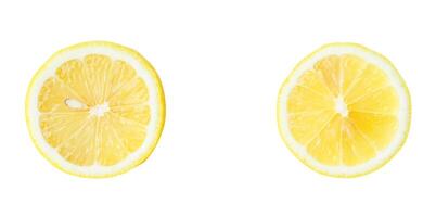Top view set of fresh yellow lemon slices or halves scattering isolated on white background with clipping path photo