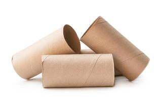 Front view of brown tissue paper cores in stack isolated on white background with clipping path photo