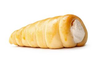 Side view of puff pastry cream horn isolated on white background with clipping path photo