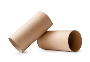 Side view of brown tissue paper cores in stack isolated on white background with clipping path photo