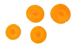 Top view set of fresh beautiful orange carrot slices or pieces scattering isolated on white background with clipping path photo