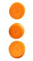 Top view set of fresh orange carrot slices scattering isolated on white background with clipping path photo