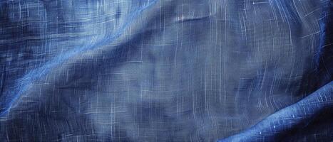 a solid blue background with a smooth fabric texture photo