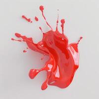 A splash of red liquid on a white background photo