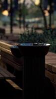 closeup of a drinking water fountain in a park on sunset video
