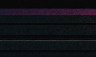 VHS effect blankets the composition mimicking white noise over a grunge film texture photo