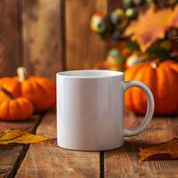 Mockup of a white coffee cup and pumpkin on an old wooden table against a background of beautiful autumn nature. Decoration for Halloween and Thanksgiving. Autumn still life, background or banner. photo