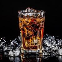 Glass of refreshing cola with ice cubes on a black background. Cool summer soda mockup. photo