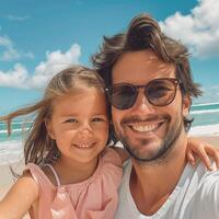 Portrait of a happy father and daughter in sunglasses enjoying a walk on the beach and taking a photo for memory. Family concept.
