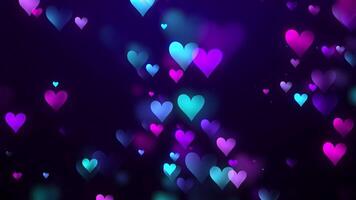 Multicolored Heart Particles Background Rising Up Bottom Left video