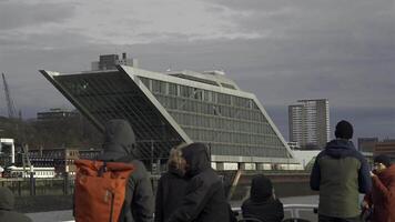 December 31, 2023. Hamburg, Germany. Modern architecture Dockland office building in Hamburg. Dockland building with staircase accessible for visitors and view over harbor and bank of river Elbe. video