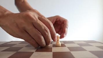 People playing chess at home and setting up the board with pieces for strategy planning and critical thinking on board game concept video
