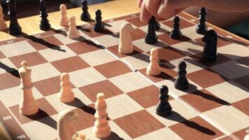 People playing chess at home and setting up the board with pieces for strategy planning and critical thinking on board game concept video
