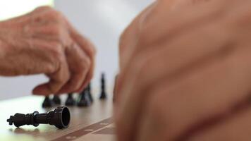 People playing chess at home and setting up the board with pieces for strategy planning and critical thinking on board game concept video