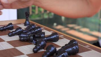 People playing chess at home and setting up the board with pieces for strategy planning and critical thinking on board game concept video
