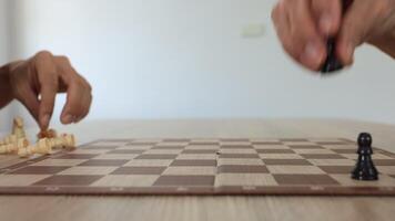 People playing chess at home and setting up the board with pieces for strategy planning and critical thinking on board game concept video