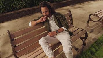 Man sitting on bench While thinking video