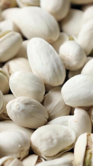 Nahansicht von Pistazie Nuss Saat Muster Textur Hintergrund, Makro Pistazien Nüsse 46779276 Stock-Video bei Vecteezy