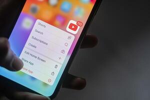 Smart phone screen with YouTube app and context menu photo