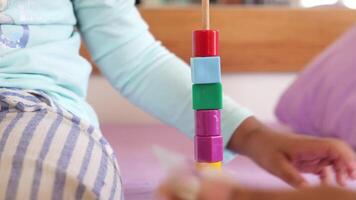 Child playing with blocks at home boosts motor skills and stimulates learning and development video