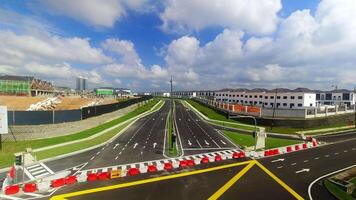 Malaysia - 5th april, 2024 -timelapse panorama row of white residential buildings complex on sunny day time lapse with cloudscape movement.Copy space property in asia background video