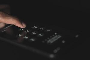 password for log-in on the screen of a cell phone - cyber security concept photo
