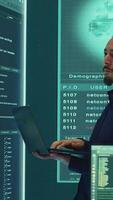 Vertical Governmental hacker expert working on securing digital information, analyzes intelligence on big screen. Specialist works to prevent cyber threats with advanced technology, cyberterrorism. Camera A. video