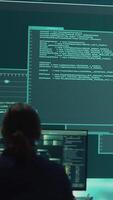 Vertical Group of governmental hackers successfully breaking into servers to steal important data, experts feeling happy and proud of their criminal achievement. Espionage system in high tech agency. Camera A. video