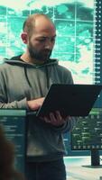 Vertical Hackers group using ransomware and phishing tactics to compromise computer networks and gather intelligence for national security and protection during cyberwarfare. Governmental spyware. Camera A. video