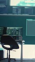 Vertical Empty governmental cyber security room with computers and software displays. Emphasis on network security, cyber defense, and intelligence gathering to prevent cyber attacks and espionage. Camera B. video
