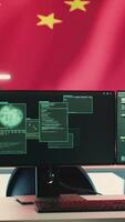 Vertical High tech surveillance room featuring a Chinese flag on big screen, concept of cyber security and brainwashing. China hybrid warfare, political manipulation and unauthorized access threats. Camera A. video