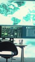 Vertical Empty governmental cyber defense and surveillance room equipped with cutting edge advanced technology. Ensuring safety from cyber attacks and digital threats with cyber security measures. Camera A. video