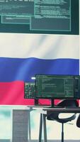 Vertical Governmental cyber operations room with Russian flag on big screen, focusing on information war and trolling. Highlighting the role of hackers in spreading disinformation and crowd control. Camera B. video