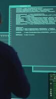 Vertical Governmental hackers at work planning advanced cyber attacks on servers infrastructure to gather intelligence, high tech spyware concept. Specialists hacking accounts for cyberwarfare. Camera A. video