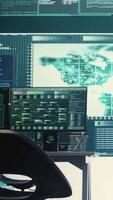 Vertical Cyber security monitoring room with high tech equipment. Governmental focus on cyber operations, cyber surveillance, and digital threats protection in an empty command workspace. Camera B. video