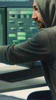 Vertical Governmental hackers doing teamwork in protecting sensitive information from cyber threats of digital mercenaries. Experts focusing on online security and cyber defense tactics. Camera A. video
