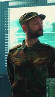 Vertical Armed forces cyber security team conducting top secret investigations, using advanced technology for secure communication and threat detection. Classified military information. Camera A. video