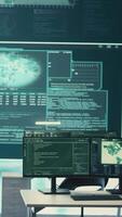 Vertical Advanced cyber surveillance room with no personnel present. Governmental agency ensuring national security through cyber security monitoring, data protection and malware detection. Camera B. video