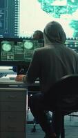 Vertical Cyber operations center with governmental hackers working on digital security activities during hybrid war. Specialists team ensuring security and malware detection, cyber surveillance. Camera A. video