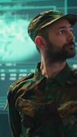 Vertical Military hackers in a secret service cyber operations room working on national security. Fighting cyber terrorism during information war and protecting against digital conflicts, high tech. Camera A. video