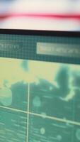 Vertical Empty digital operations room with an american flag running on big screen, emphasizing network security and cyber safety. Advanced technology and hacking tools for national security. Camera B. video