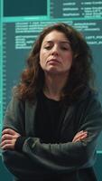 Vertical Cyber security expert in a national safety operations center detecting cyber attacks or threats. Governmental hacking team focusing on data protection, cyber operations in progress. Camera A. video