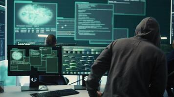 Governmental agency team conducting cyber security monitoring and threat detection tactics. IT experts work on cybercrime prevention, network security and information protection. Camera B. video