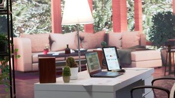 Empty home office desk filled with documents and business reports on laptop, space used for a person to study the market and work on accountancy. Startup budget balance analysis. video