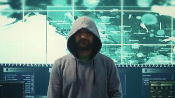 Governmental hacker works with secure data on a computer network, espionage agency big screen. Cybersecurity measures to protect against digital threats and data breaches. Camera B. video